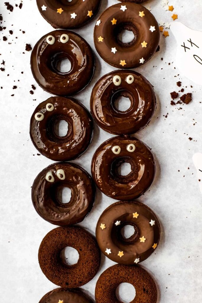 Chocolate donuts decorated with goggly eye