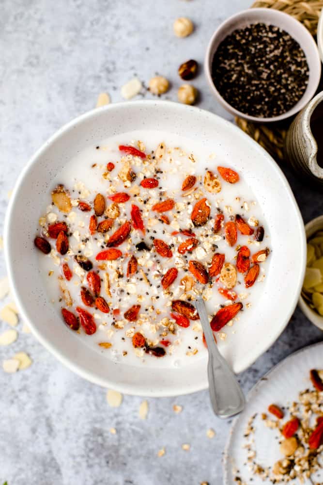 A white bowl containing delicious breakfast. 