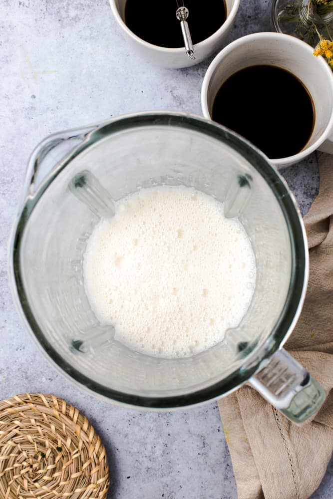 Foamed oat milk in a blender. 