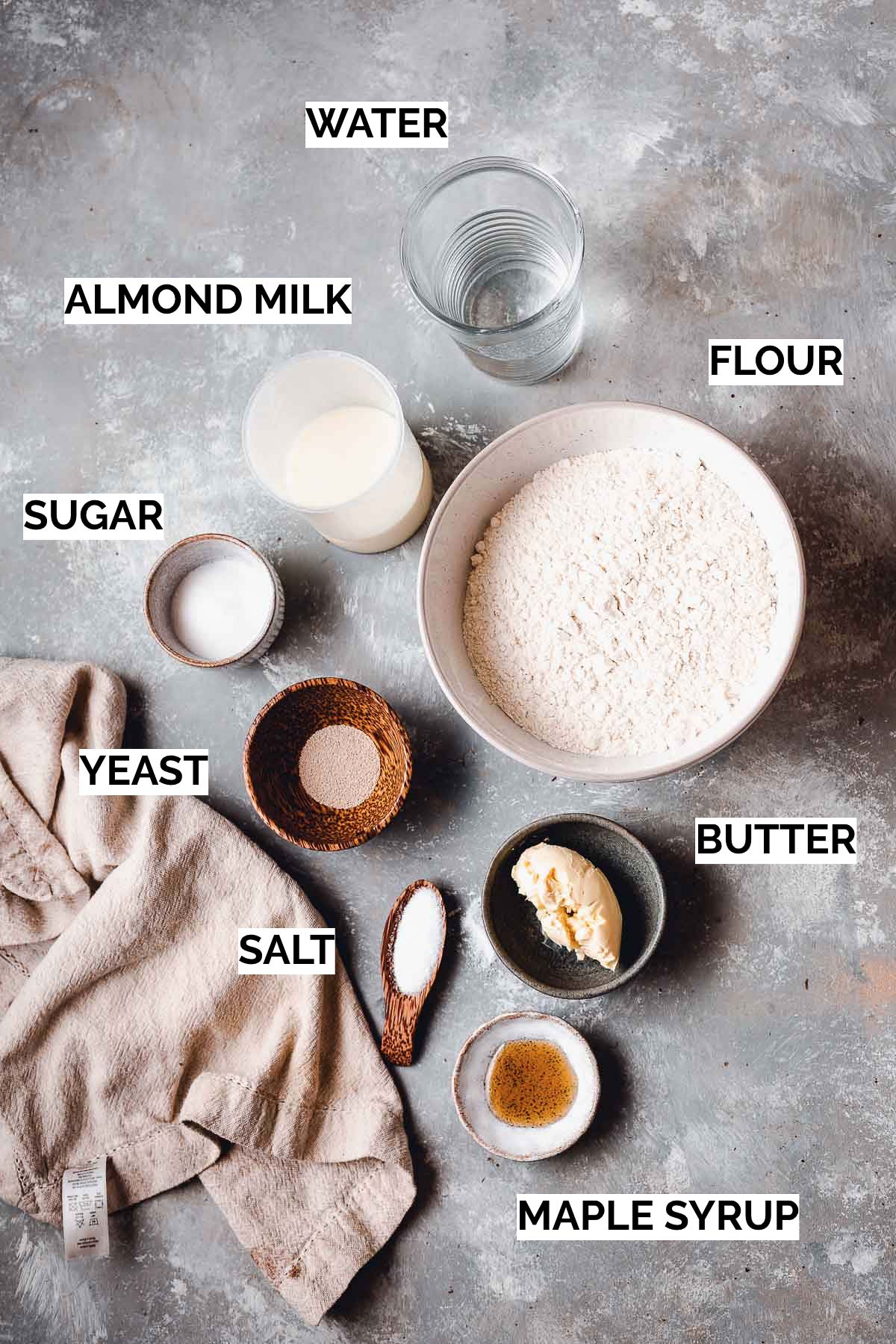 All ingredients needed to make a dinner roll laid out. 