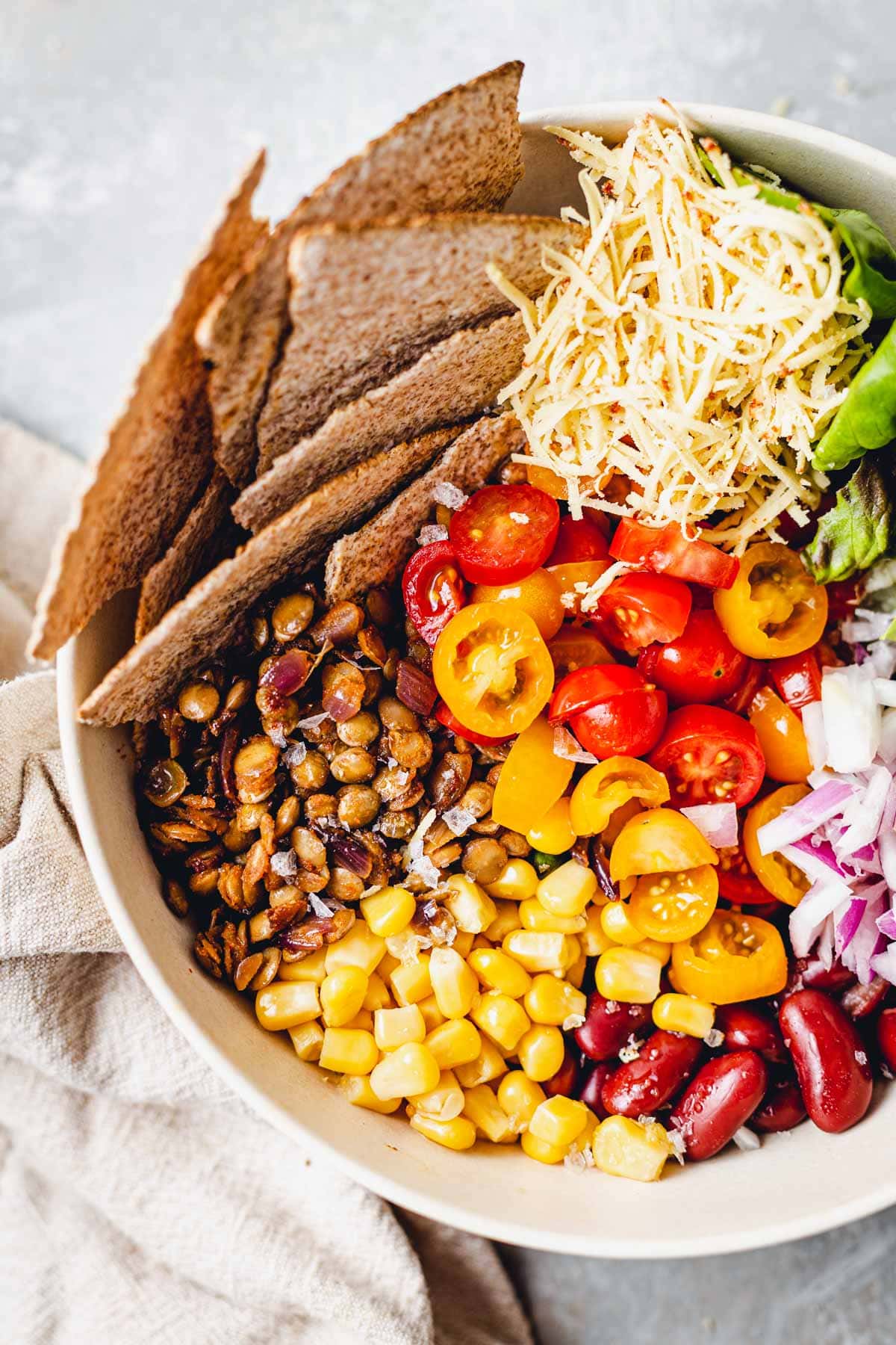 A close-up image of a bowl of colourful taco salad. 