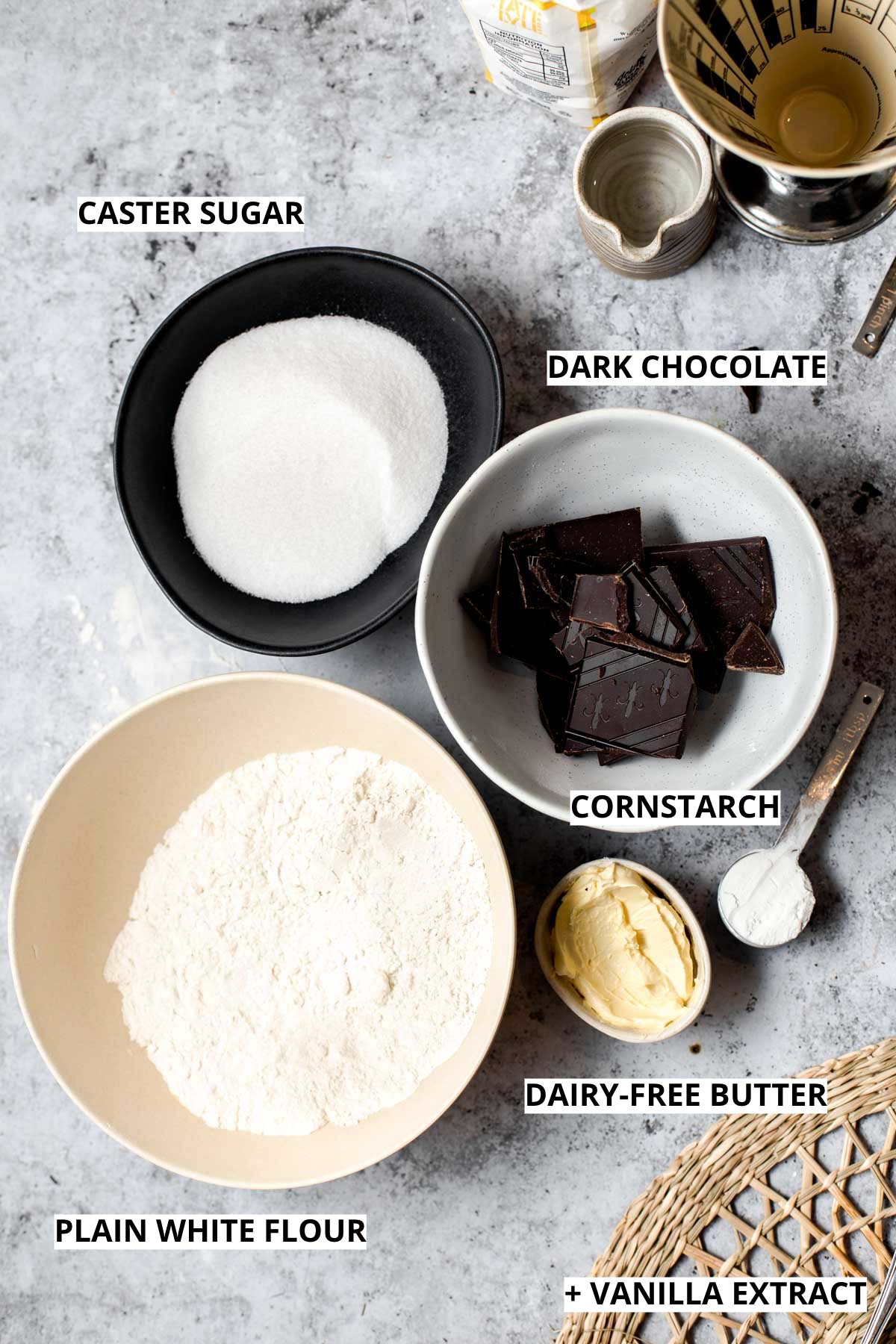 The ingredients needed to bake vegan shortbread cookies.