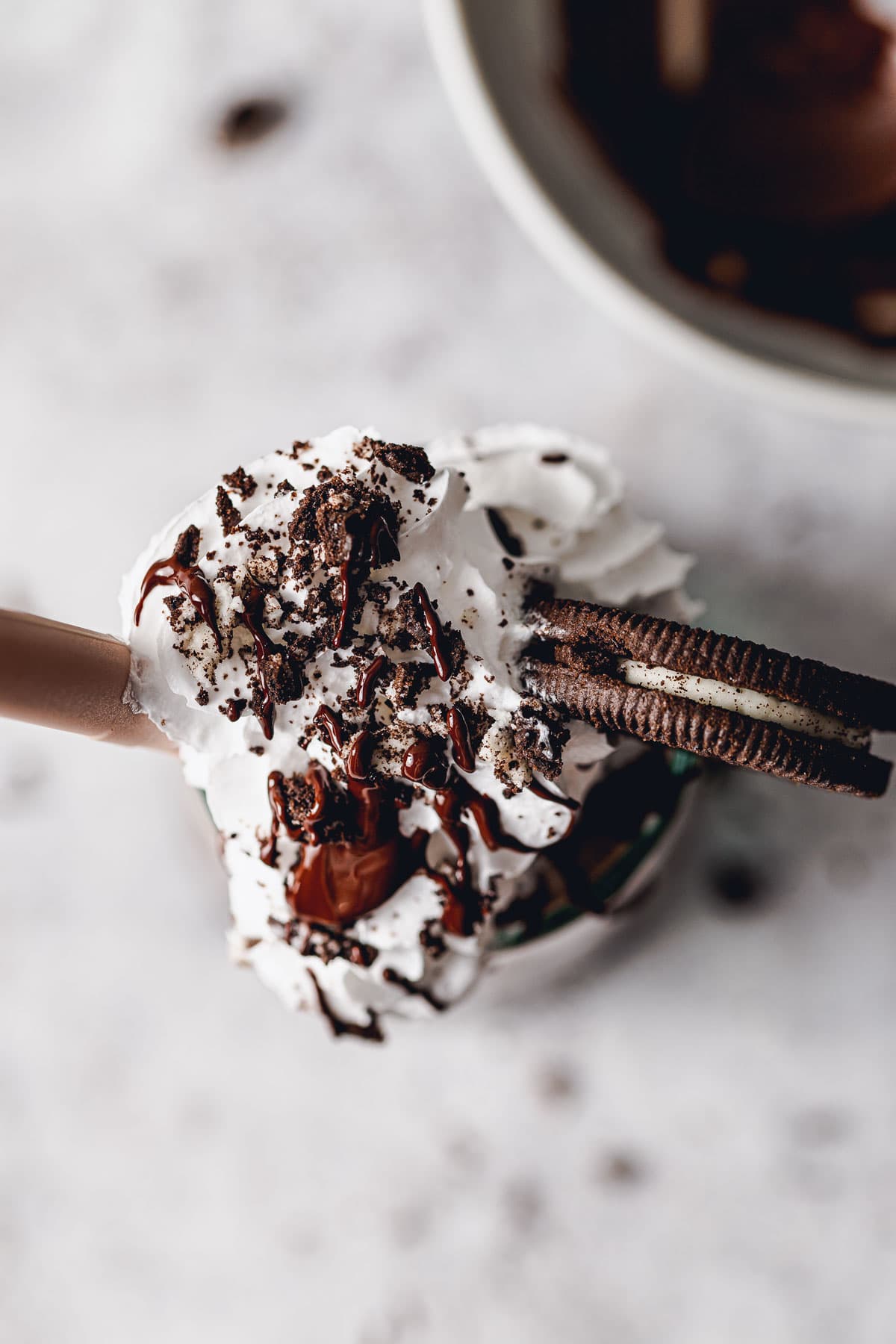 A close-up image of a top of Oreo frappe.