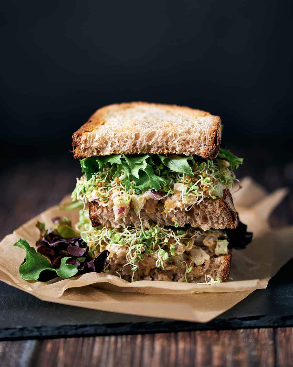 Vegan tuna sandwich with salad and other toppings.