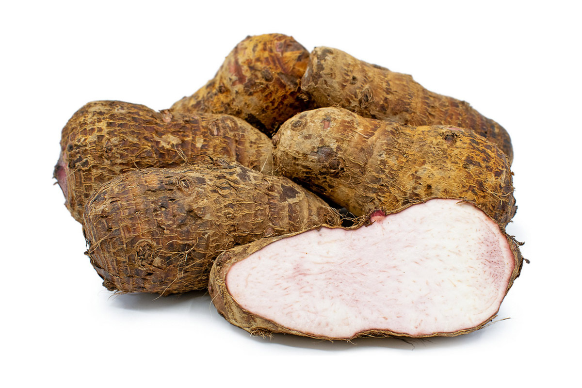 Several small taro roots placed on a white background.