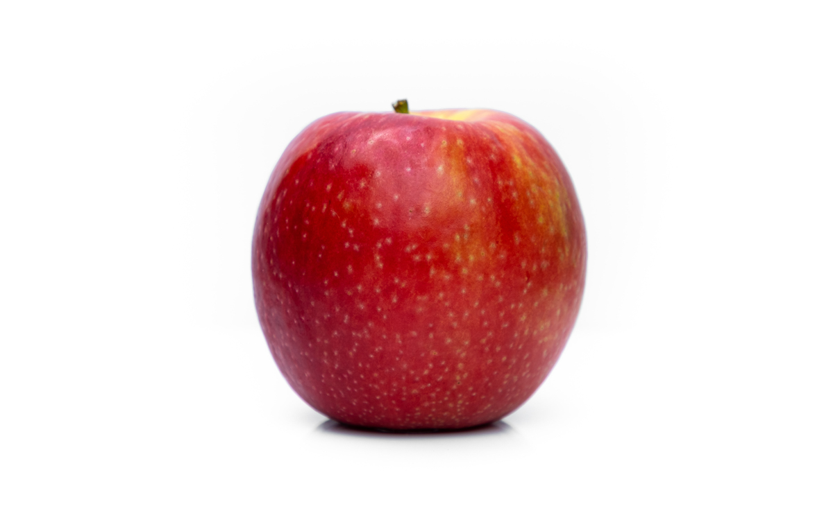Pink Lady Apple isolated on a white background. 