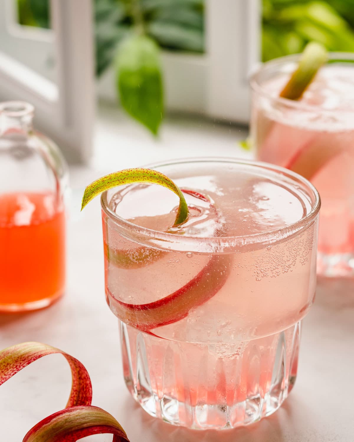 A fizzy summer drink made of rhubarb and topped off with ice.