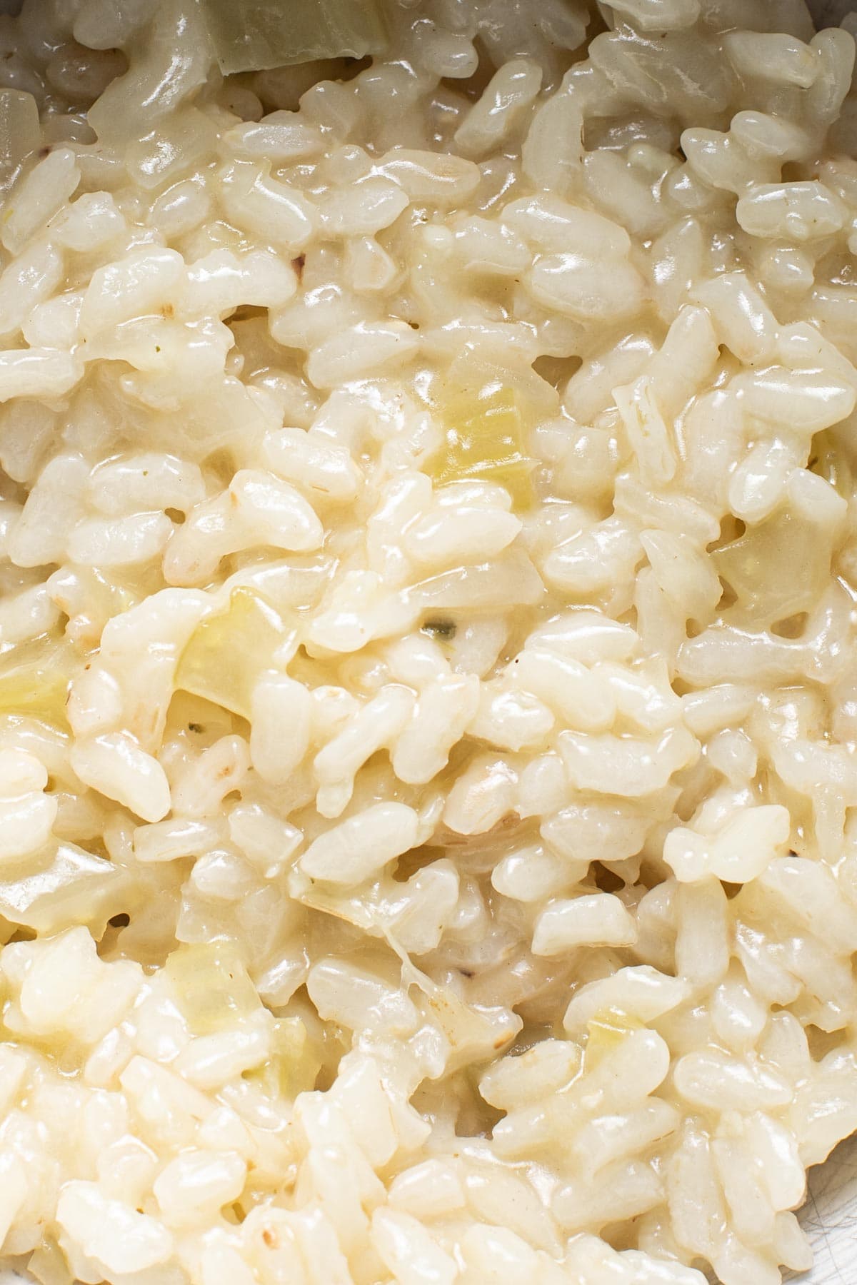 A very close-up image of cooked risotto in a bowl.