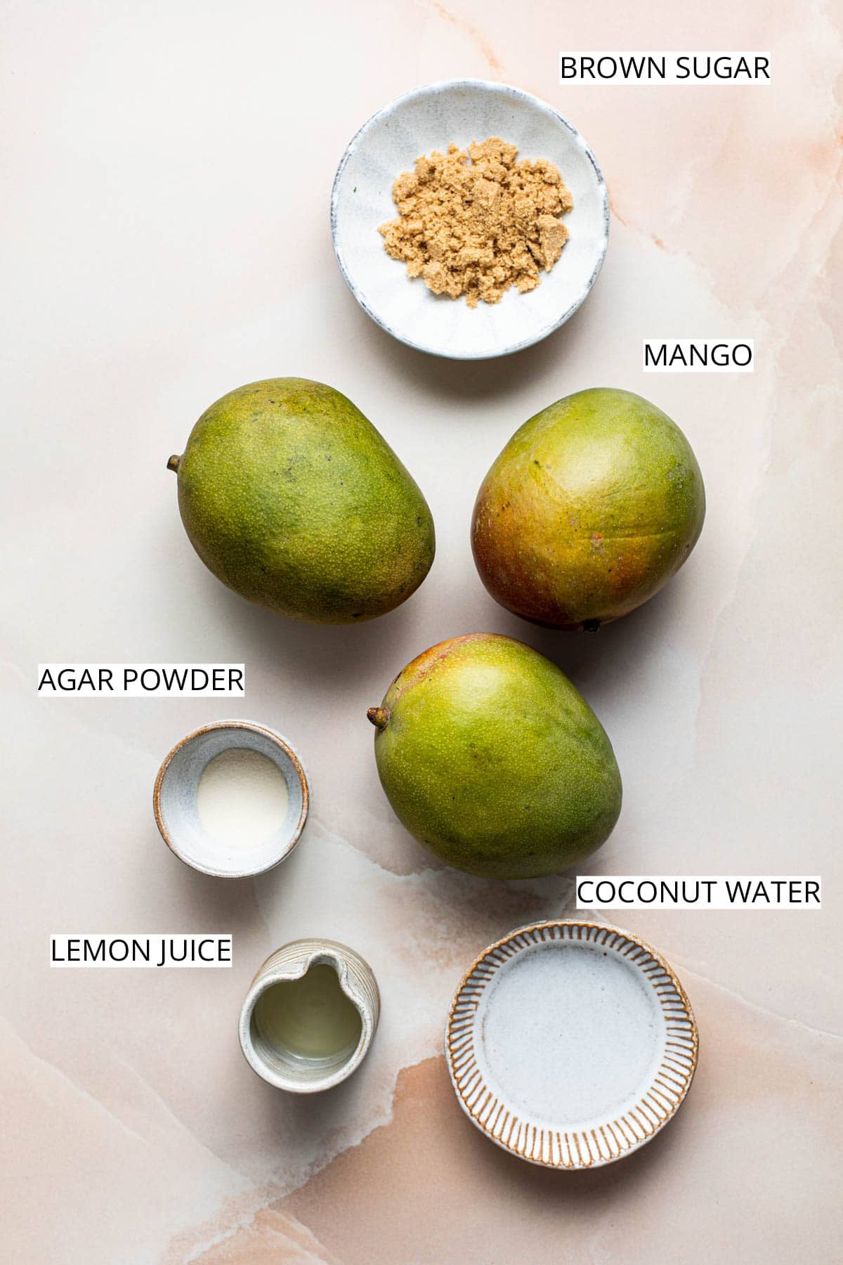 All ingredients needed to make mango jelly.