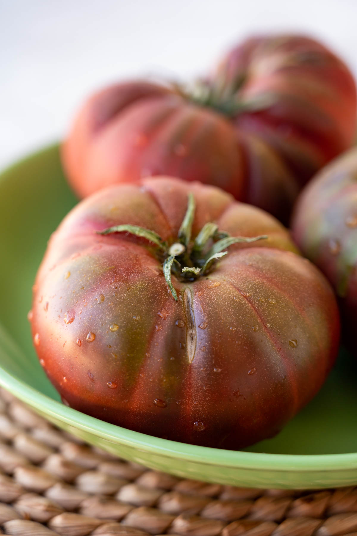 Close-up image of fresh Black Russian tomatoes.