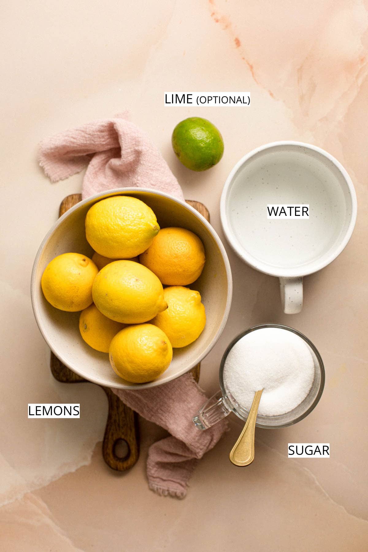 All ingredients needed to make frozen lemonade concentrate.