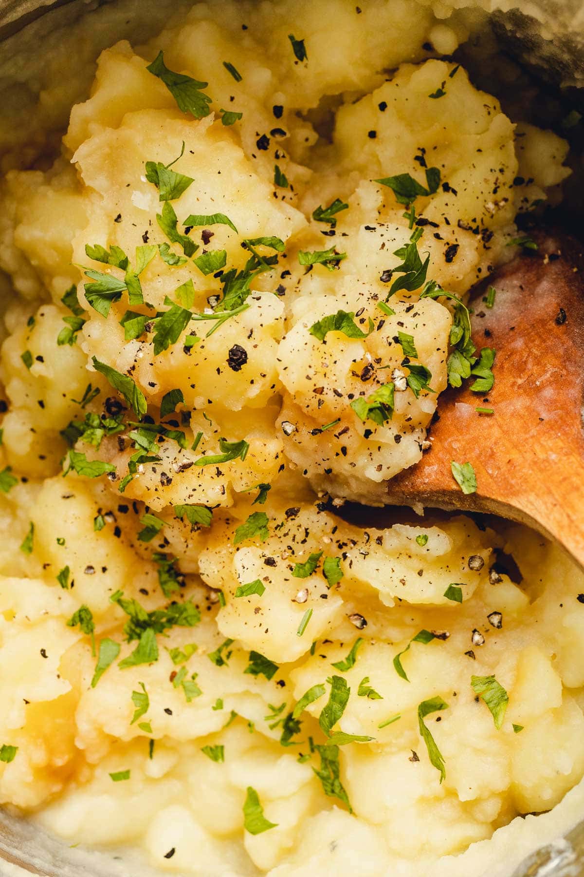 A close-up image of stewed potatoes.