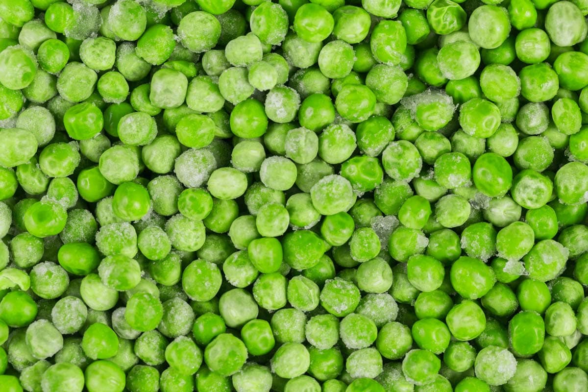Frozen green peas as a background. 
