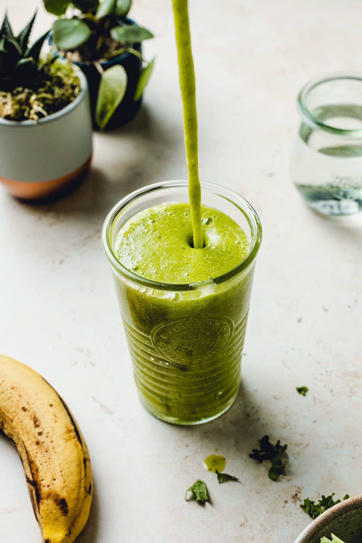 Smoothie being poured into a glass.