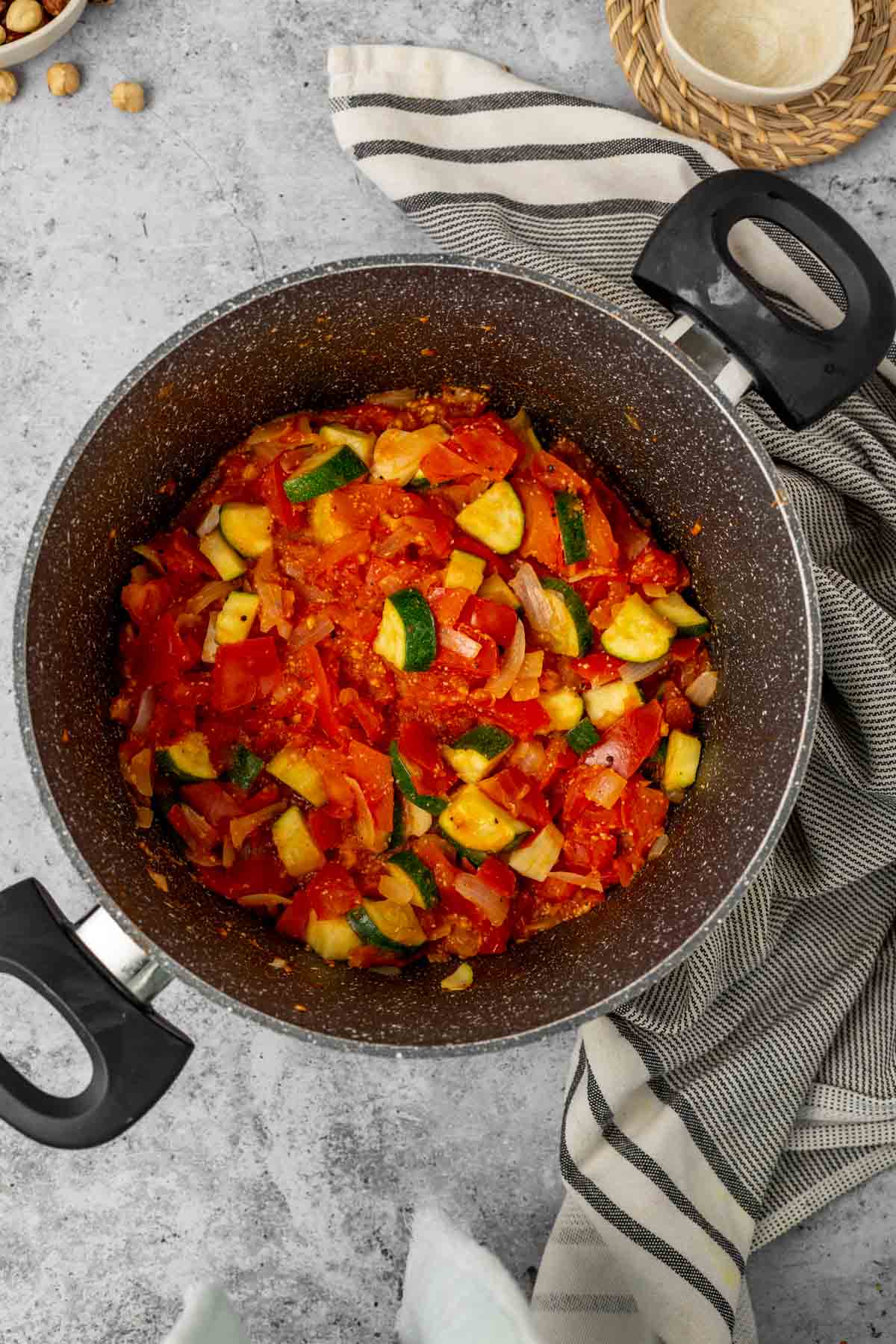 Sauteed veggies in a pan.