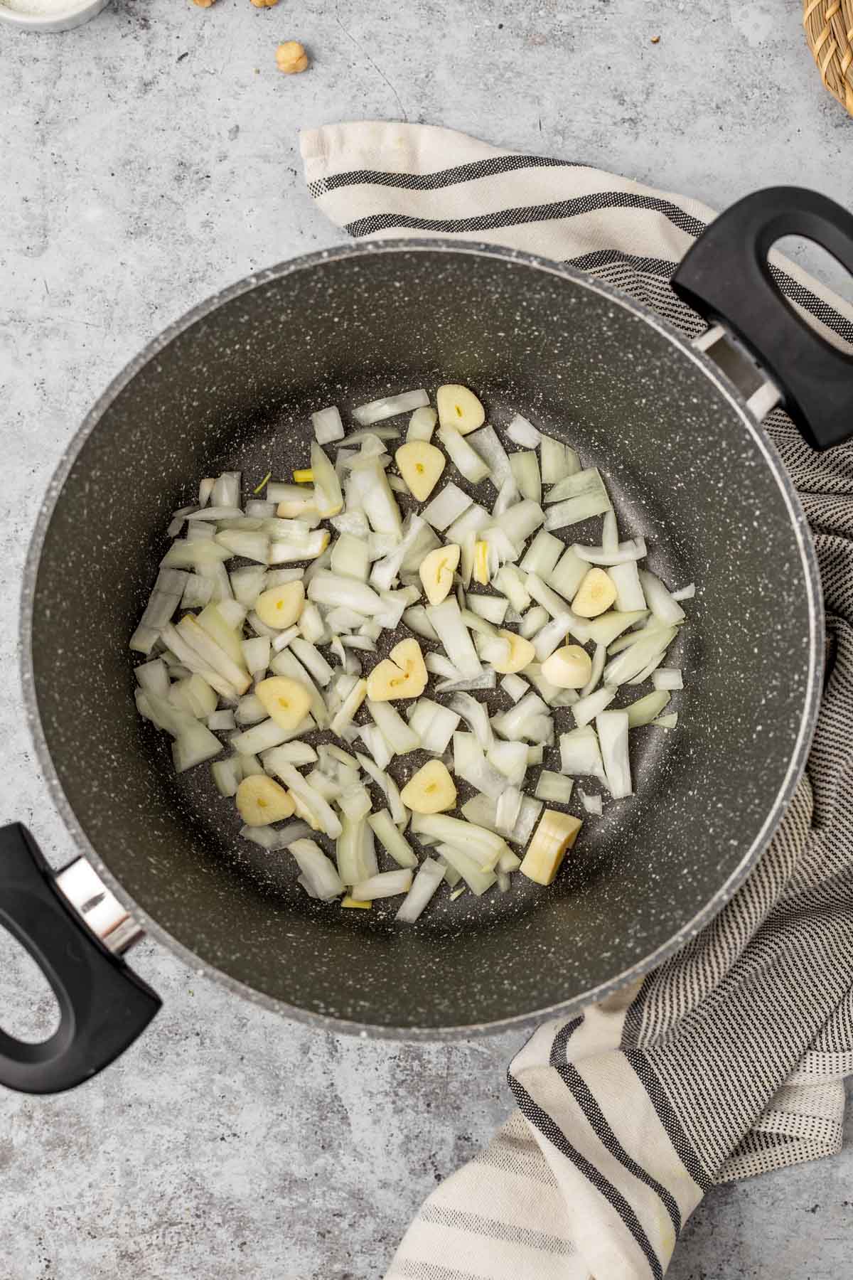 Chopped onion and garlic in a large pot.