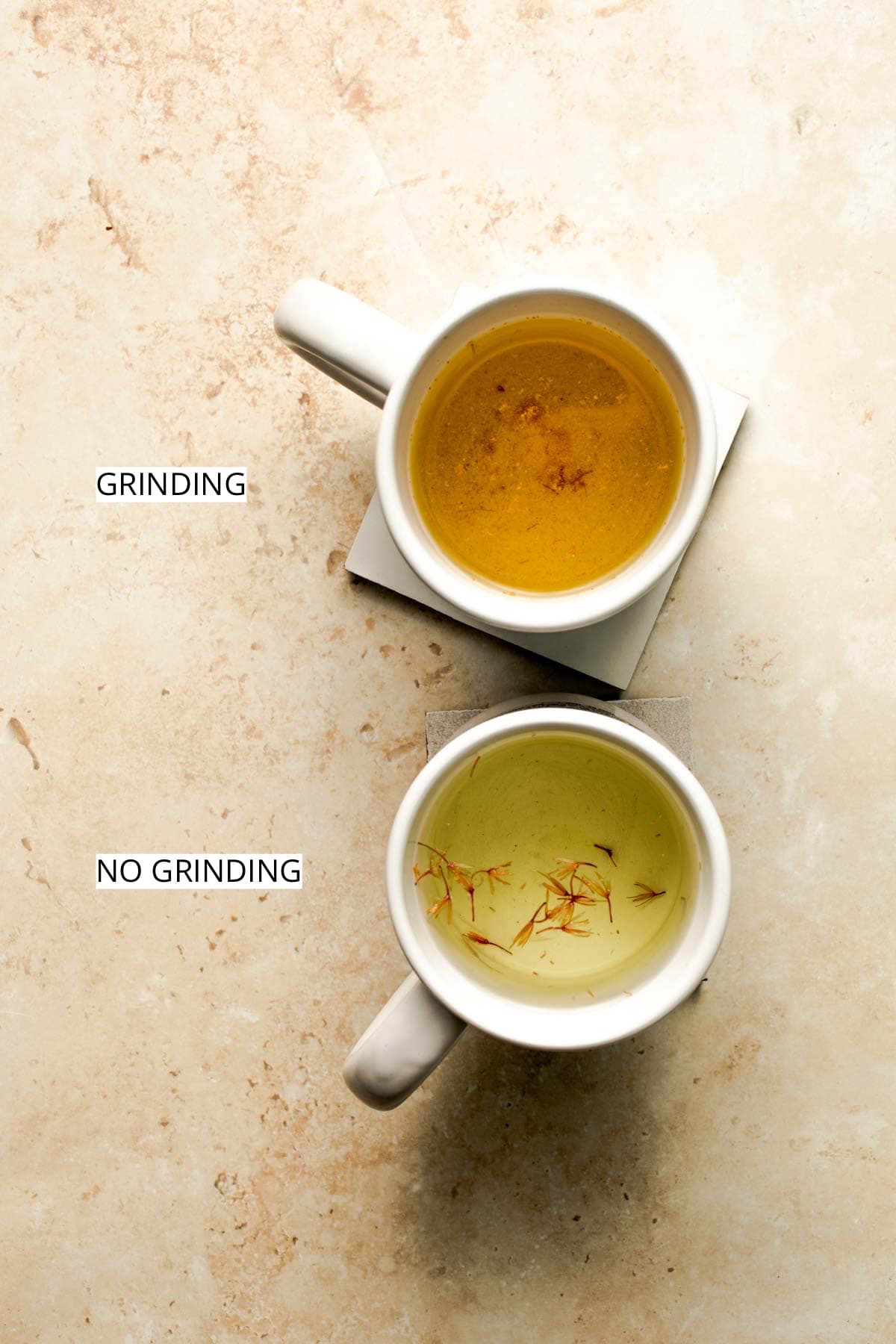 Two mugs showing the difference between grinding and not grinding saffron.