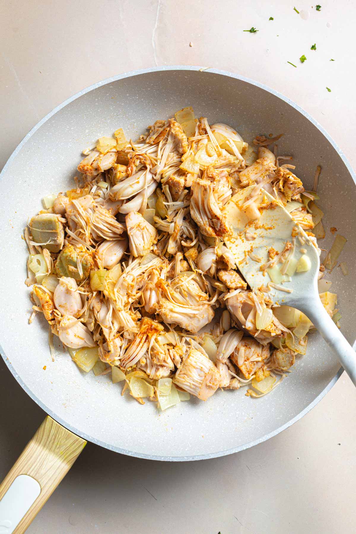 Sautéed aromatics with jackfruit and seasoning