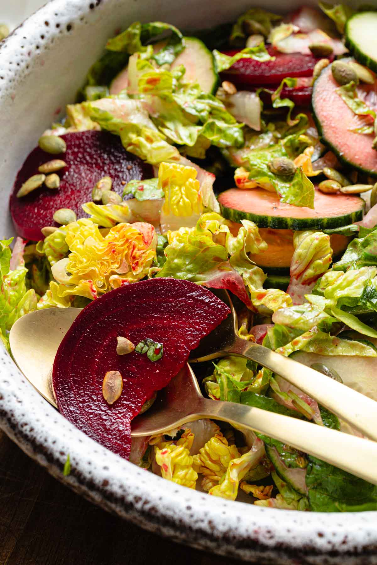A close-up of cooked beet in a salad.