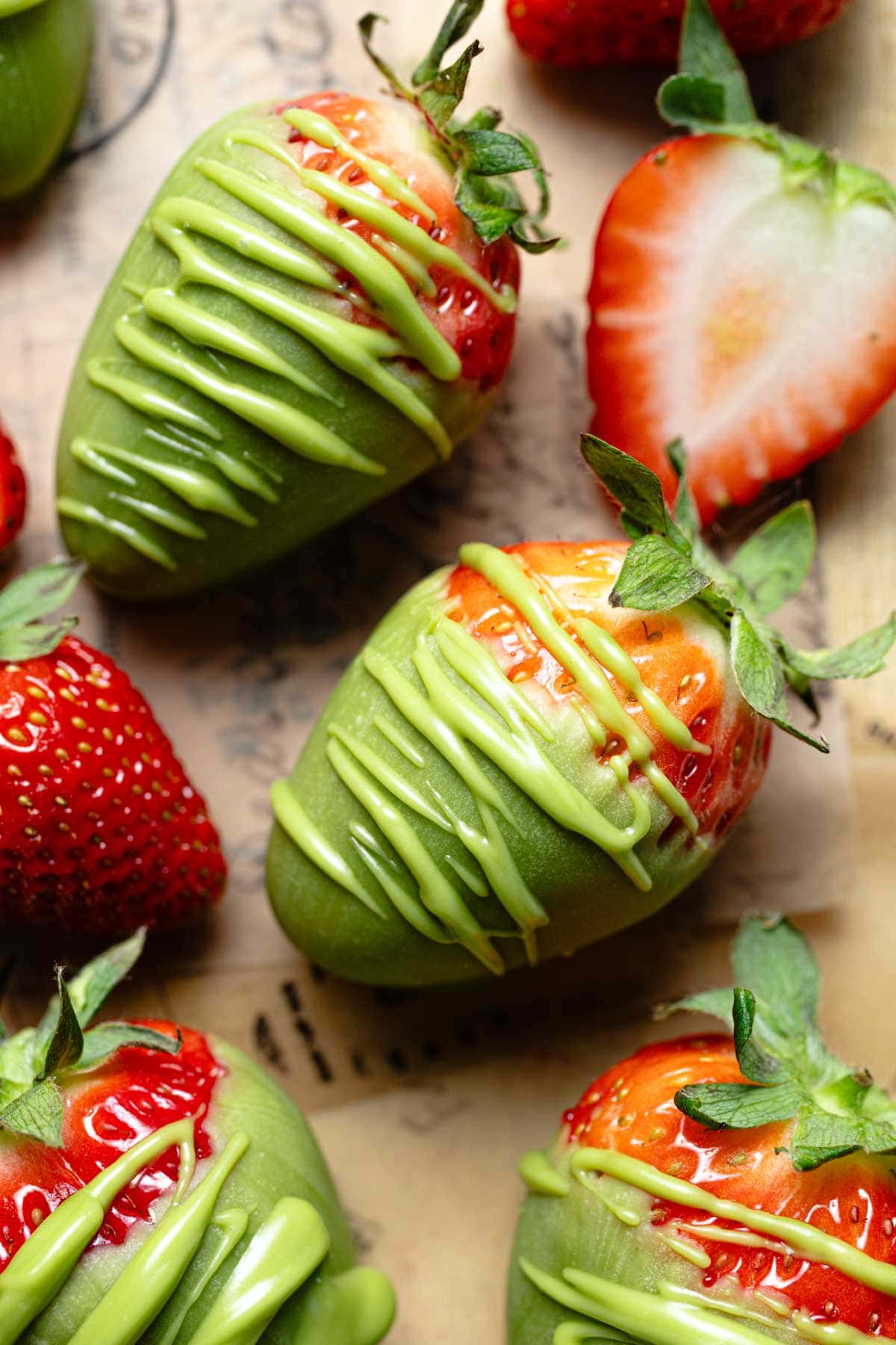 Close-up view of matcha drizzled strawberry