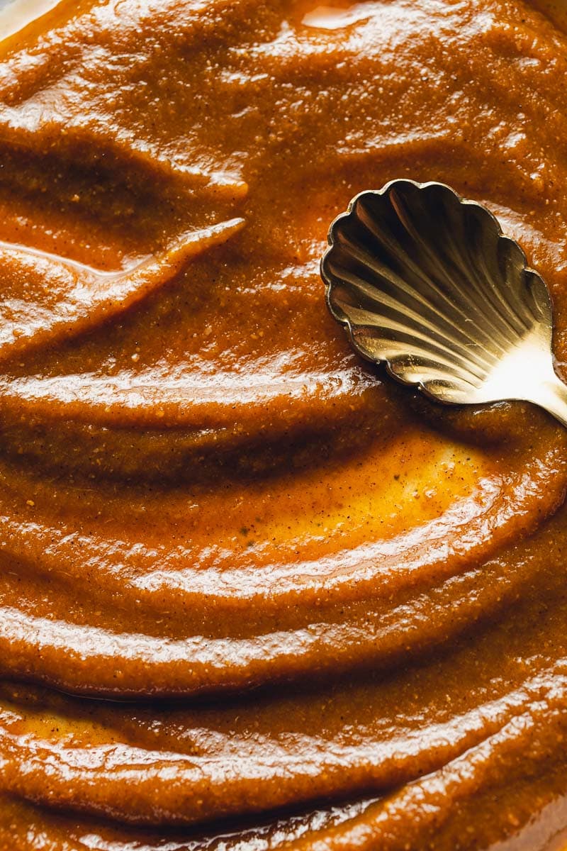 Close-up of pumpkin sauce with a spoon