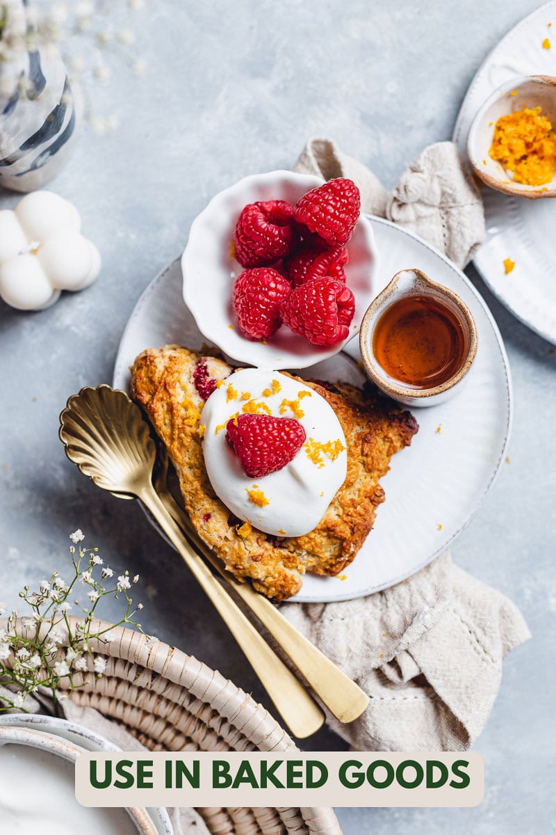 Scone with raspberries on a plate