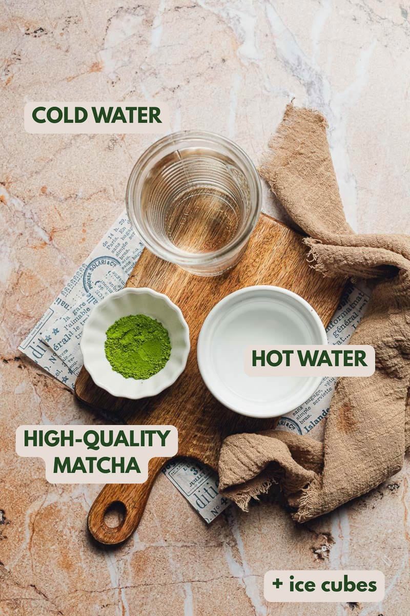 Water and matcha on a chopping board