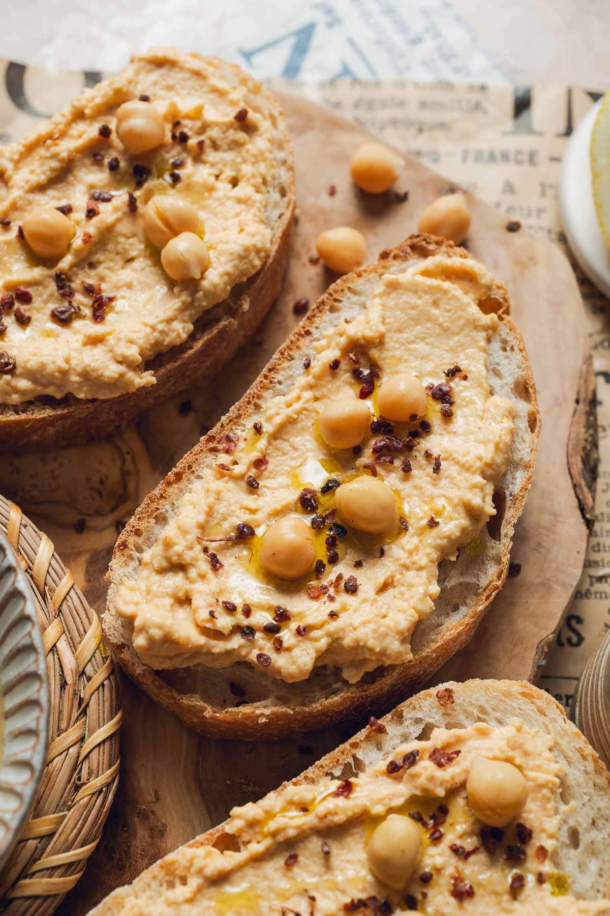 Three slices of bread and hummus