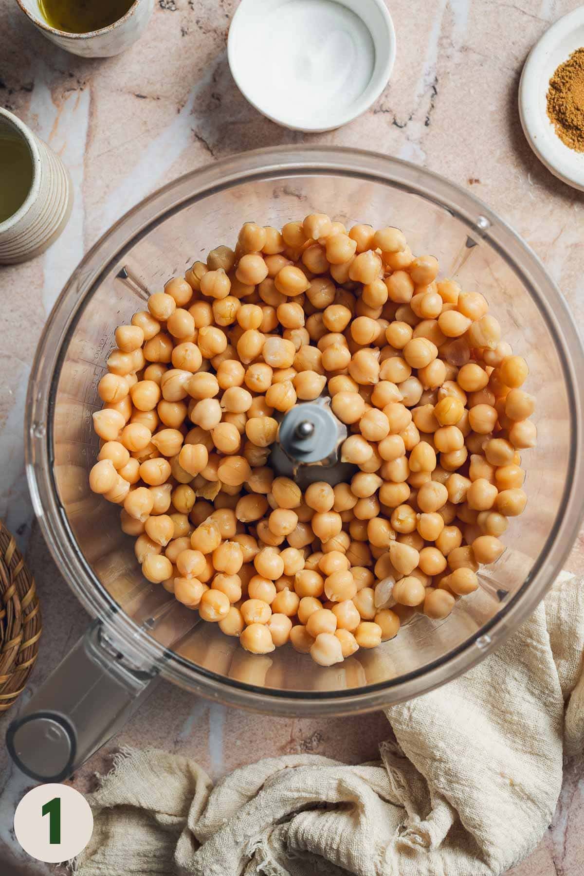Whole chickpeas in a food processor