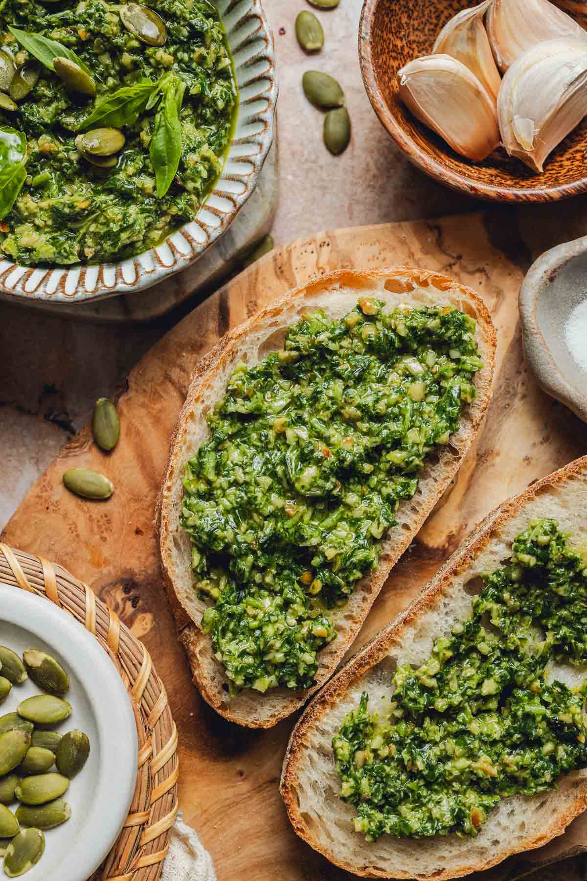 Two pieces of bread with pesto