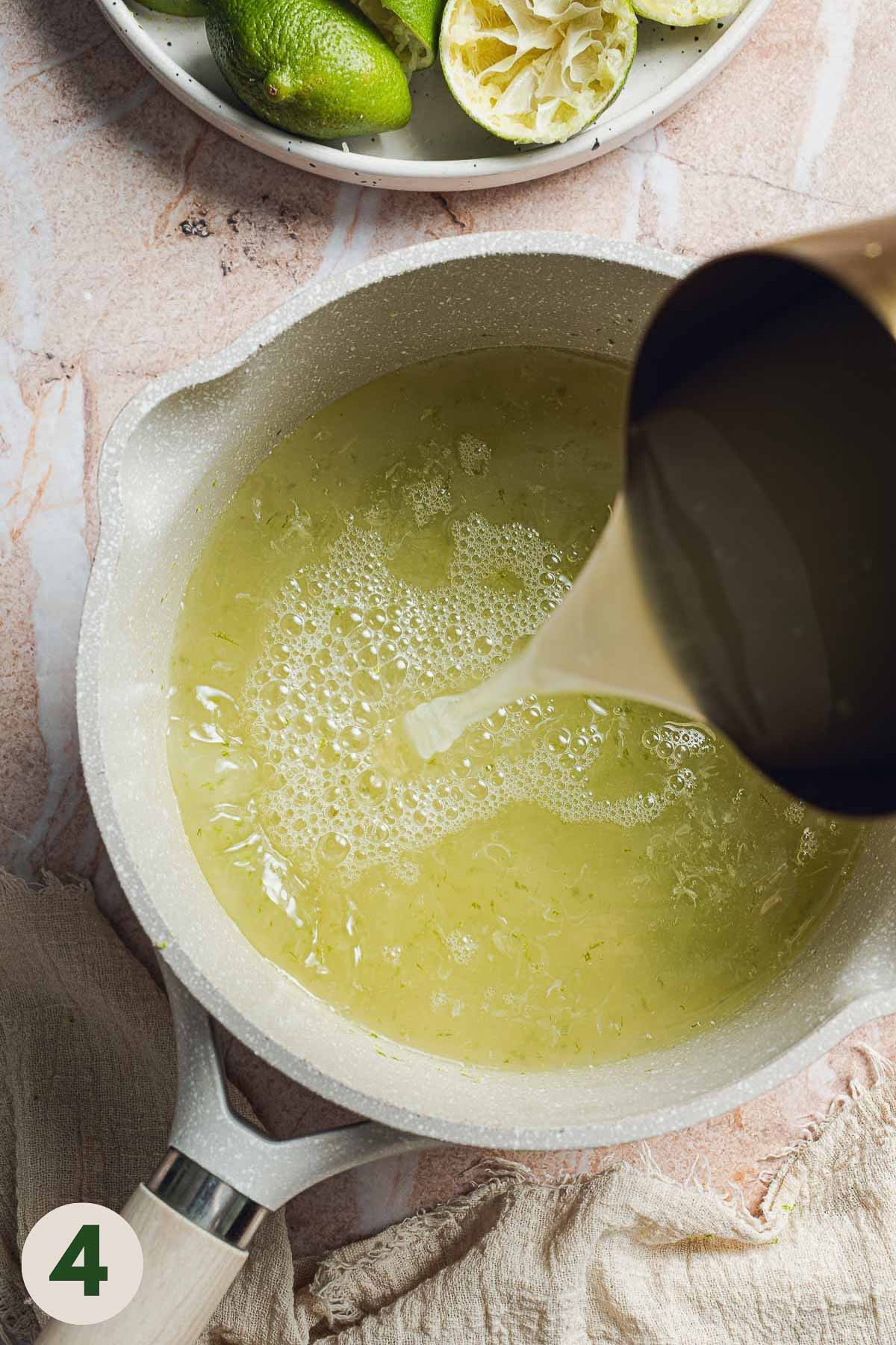 Lime juice being poured into a pan